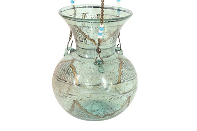 Lot 837 - A MAMLUK-REVIVAL ENAMELLED CLEAR GREEN GLASS MOSQUE LAMP