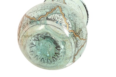 Lot 837 - A MAMLUK-REVIVAL ENAMELLED CLEAR GREEN GLASS MOSQUE LAMP