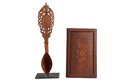 Lot 261 - A CARVED FRUITWOOD PORTABLE MIRROR AND CEREMONIAL SHERBET SPOON