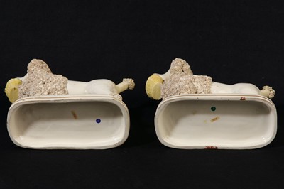 Lot 211 - A pair of Staffordshire poodles, circa 1840s, in the manner of John and Rebecca Lloyd of Shelton