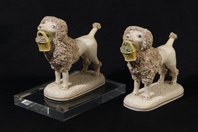 Lot 211 - A pair of Staffordshire poodles, circa 1840s, in the manner of John and Rebecca Lloyd of Shelton
