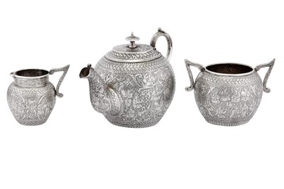 Lot 190 - A late 19th / early 20th century Iranian (Persian) silver three-piece tea service, Isfahan circa 1900