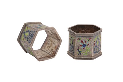 Lot 183 - A pair of early 20th century Iranian (Persian) silver and champlevé enamel napkin rings, probably Rasht circa 1910