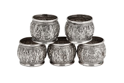 Lot 178 - A set of five Iranian (Persian) silver napkin rings, Shiraz circa 1920