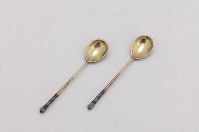 Lot 280 - A pair of Nicholas II Russian 84 zolotnik (875 standard) silver gilt and cloisonne enamel coffee spoons, Moscow 1898-1908 by Mikhail Aleksandrov (active 1883-1908)