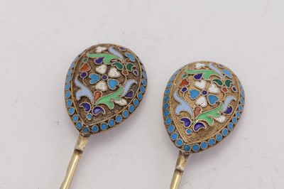 Lot 280 - A pair of Nicholas II Russian 84 zolotnik (875 standard) silver gilt and cloisonne enamel coffee spoons, Moscow 1898-1908 by Mikhail Aleksandrov (active 1883-1908)
