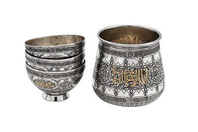 Lot 278 - An early 20th century Syrian gold inlaid unmarked silver six-piece Turkish coffee set, Damascus circa 1920