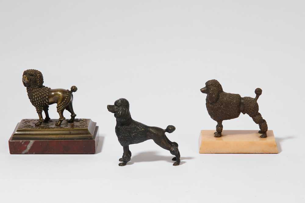 Lot 399 - A contemporary cold painted bronze figure of a clipped poodle