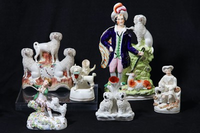 Lot 198 - A large late 19th century Staffordshire figure of a shepherd and his poodle