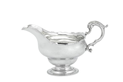 Lot 427 - A George III Scottish sterling silver sauceboat, Edinburgh 1771 by James Gilliland (1721-91, reg. 1748)