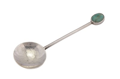 Lot 385 - An Edward VIII sterling silver and turquoise ‘arts and crafts’ spoon, London 1936 by Amy Sandheim