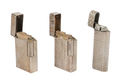 Lot 185 - Cartier and S T Dupont silver plated lighters