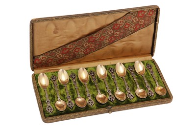 Lot 245 - A cased set of twelve late 19th century French 950 standard parcel gilt silver teaspoons, Paris circa 1890 by Alphonse Debain (active 1883-1911)