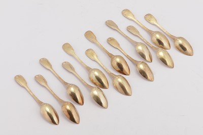 Lot 129 - A set of twelve Charles X French 950 standard silver gilt teaspoons, Paris 1819-34 by Francois-Dominique Naudin (reg. Nov 1800 – biff. 30th May 1834)