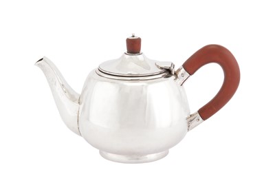 Lot 270 - An Elizabeth II sterling silver ‘hand crafted’ teapot, Birmingham 1958 by MMC