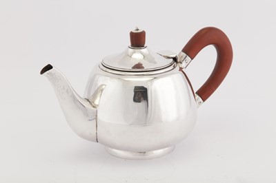 Lot 272 - An Elizabeth II sterling silver ‘hand crafted’ teapot, Birmingham 1958 by May Maria Cassie (reg. 21st April 1958)