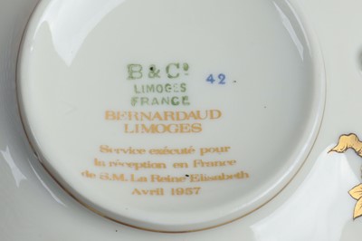 Lot 237 - A Limoges (Bernardaud) porcelain gilt ivory-ground dinner & dessert service