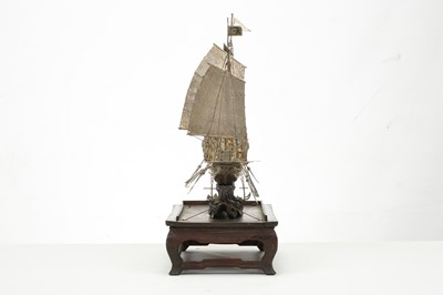 Lot 83 - A CHINESE EXPORT SILVER MODEL OF A BOAT. Circa...