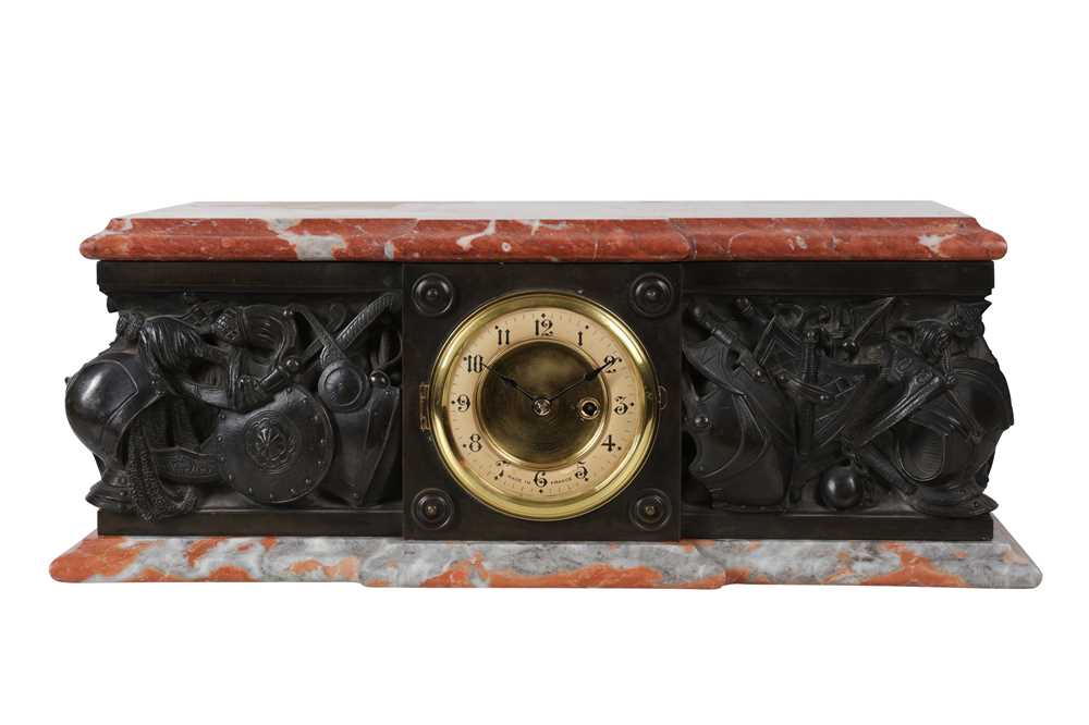 Lot 37 - AN EARLY 20TH CENTURY FRENCH PATINATED BRONZE AND RED MARBLE PLINTH CLOCK