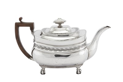 Lot 443 - A George III sterling silver teapot, London 1812 by Samuel Wheatley & John Evans I (reg. 27th April 1810)