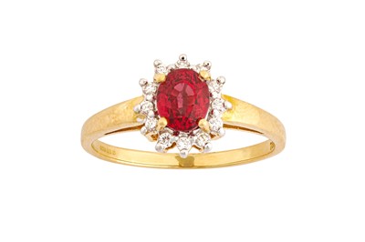 Lot 138 - A ruby and diamond gold cluster ring