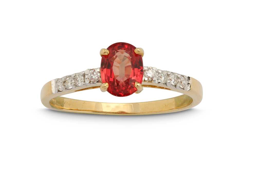 Lot 1278 - An orange sapphire and diamond ring