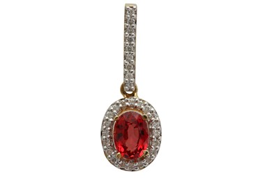 Lot 1282 - An orange sapphire and diamond pendant