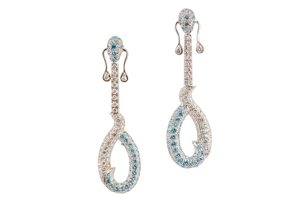 Lot 91 - A pair of blue topaz and diamond pendent earrings