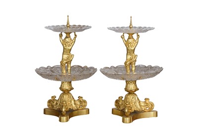 Lot 79 - A PAIR OF EARLY 20TH CENTURY GILT BRONZE AND CUT GLASS TWO-TIER SURTOUT DE TABLE OR TABLE CENTREPIECES