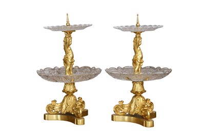 Lot 79 - A PAIR OF EARLY 20TH CENTURY GILT BRONZE AND CUT GLASS TWO-TIER SURTOUT DE TABLE OR TABLE CENTREPIECES