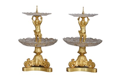 Lot 423 - A pair of early 20th century gilt bronze and cut glass table centre pieces, in the Empire style