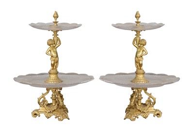 Lot 80 - A PAIR OF EARLY 20TH CENTURY GILT BRONZE AND CUT GLASS TWO-TIER SURTOUT DE TABLE OR TABLE CENTREPIECES