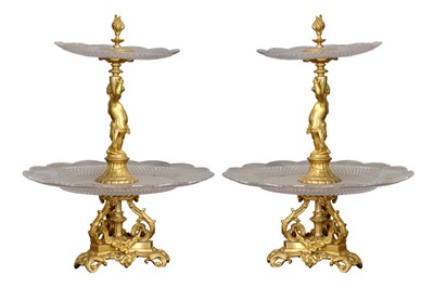 Lot 166 - A PAIR GILT BRONZE AND CUT GLASS TWO-TIER TABLE CENTRE PIECES, EARLY 20TH CENTURY