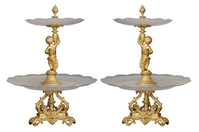 Lot 80 - A PAIR OF EARLY 20TH CENTURY GILT BRONZE AND CUT GLASS TWO-TIER SURTOUT DE TABLE OR TABLE CENTREPIECES
