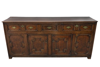 Lot 652 - An early 18th century and later joined oak dresser base
