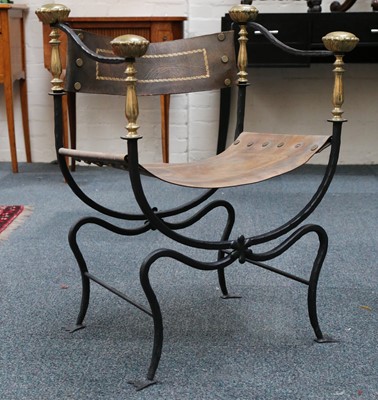 Lot 72 - A pair of wrought iron and brass throne chairs...