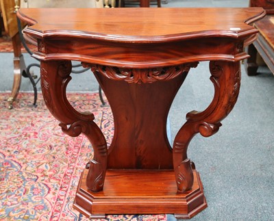 Lot 73 - A 20th Century mahogany consul table with...