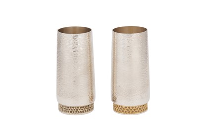 Lot 408 - A pair of Elizabeth II modernist parcel gilt sterling silver beakers, London 1978/80 by Stuart Devlin (1931-2018)