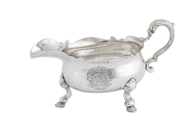 Lot 458 - A George II sterling silver sauceboat, London 1736 by John Eckfourd II (reg. 23rd June 1725)