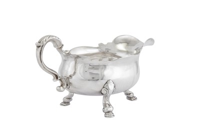 Lot 458 - A George II sterling silver sauceboat, London 1736 by John Eckfourd II (reg. 23rd June 1725)
