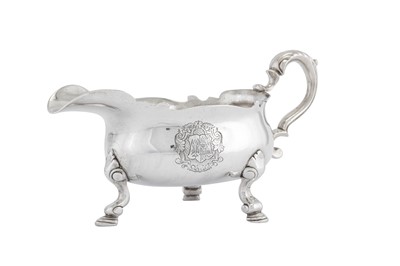 Lot 458 - A George II sterling silver sauceboat, London 1736 by John Eckfourd II (reg. 23rd June 1725)