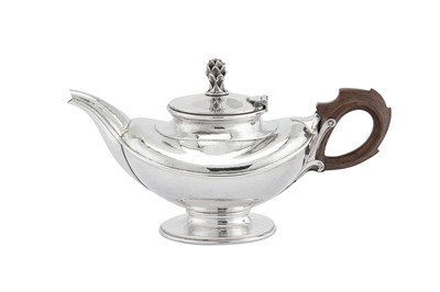 Lot 387 - A George V sterling silver ‘Art and Crafts’ teapot, London 1931 by Omar Ramsden (1873–1939)