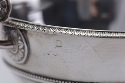 Lot 243 - A Louis XVII / early 19th century French 950 standard silver écuelle and stand, Paris 1819-38 mark of O.B. Bourgois
