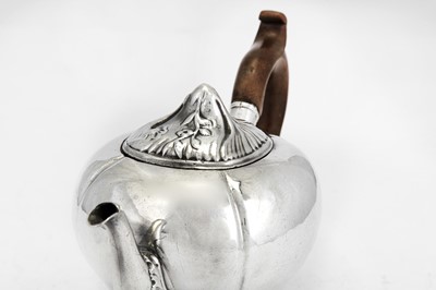 Lot 114 - A mid-18th century Dutch silver teapot, Amsterdam 1752 by Matthijs Crayenschot (1714-96)