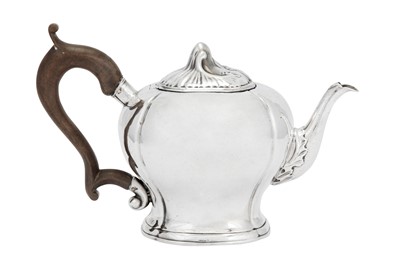 Lot 114 - A mid-18th century Dutch silver teapot, Amsterdam 1752 by Matthijs Crayenschot (1714-96)
