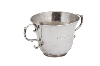 Lot 404 - A mid-18th century George III silver Channel Islands twin handled cup, Guernsey circa 1770 by Pierre Maingy (born c. 1718, active c.1755/1775)