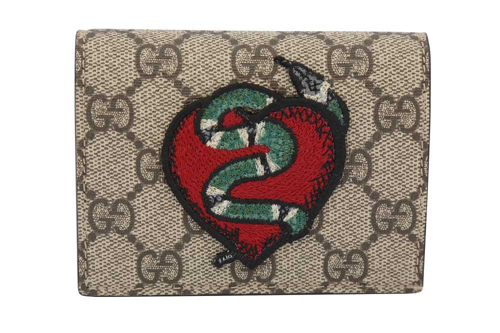 Lot 177 - Gucci Beige Supreme Heart & Snake Wallet