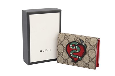 Lot 177 - Gucci Beige Supreme Heart & Snake Wallet