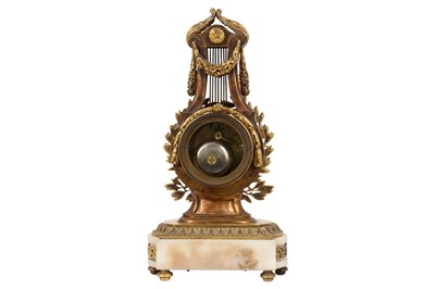 Lot 27 - A LATE 19TH CENTURY FRENCH GILT BRONZE AND WHITE MARBLE LYRE MANTEL CLOCK