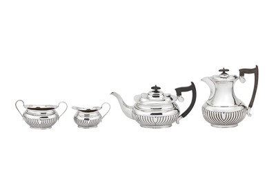 Lot 339 - A George V sterling silver four-piece tea and coffee service, Sheffield 1921/22 by Emile Viner